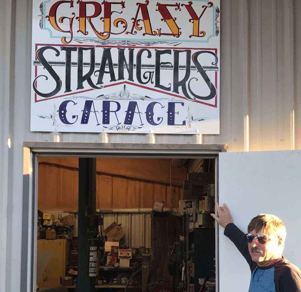 Greasy Strangers Garage Ken Valentine at his classic car garage "Greasy Strangers Garage"